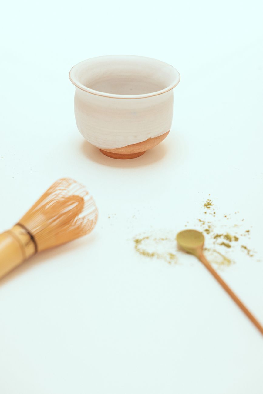 Ceramic tea bowl and whisk prepared for traditional ceremony